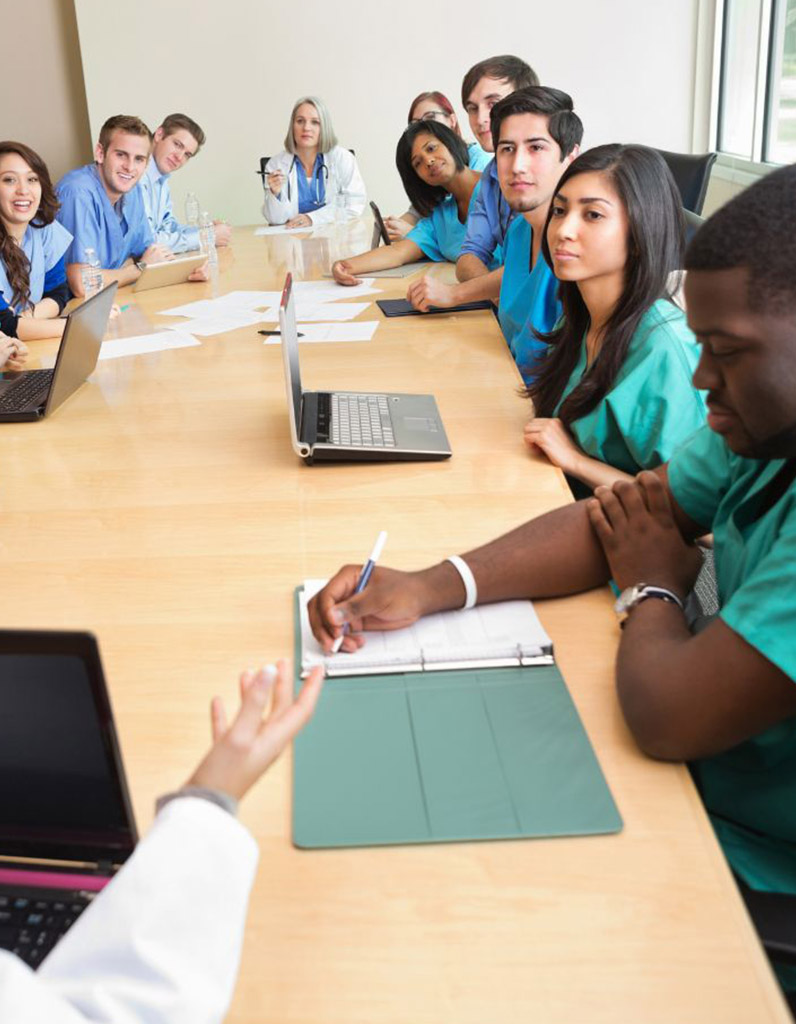 Group of medical professionals at a conference table